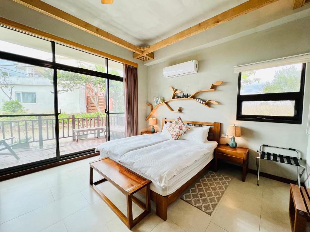 Kenting COMIC B&B&SPRING客房内的一张或多张床位