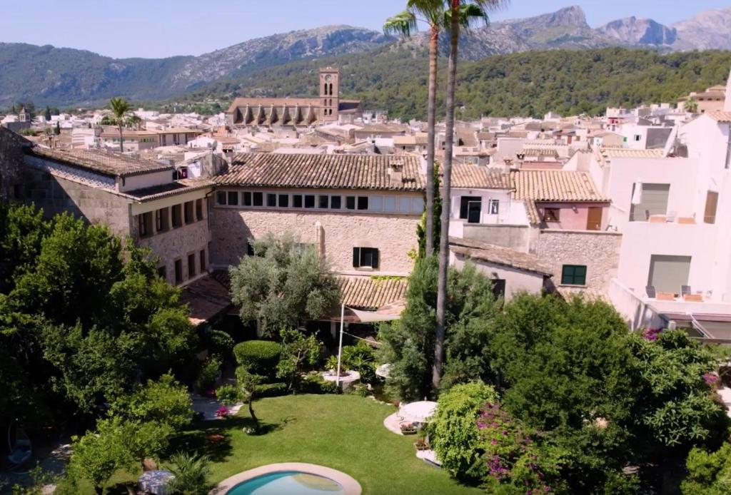 a view of a town with mountains in the background at Son Sant Jordi in Pollença