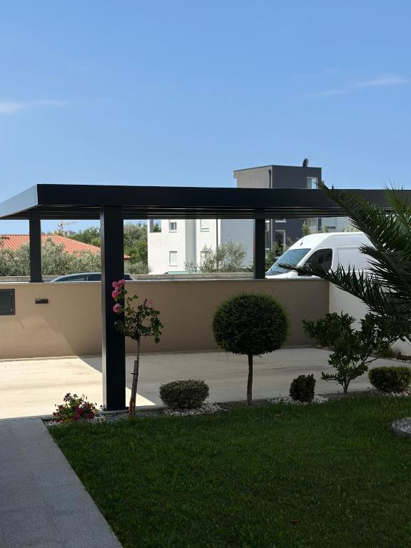 Vonkajšia záhrada v ubytovaní Apartment Jurić