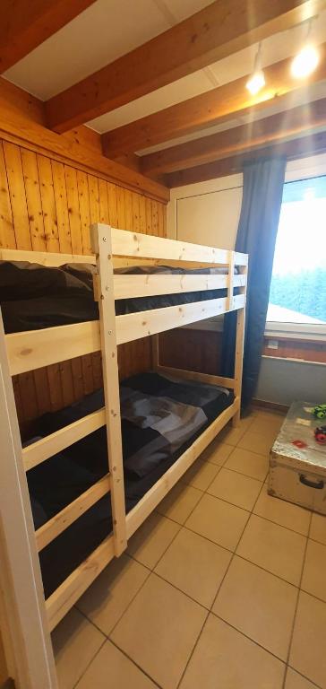 Postel nebo postele na pokoji v ubytování Superbe appartement 3.5 avec cheminée