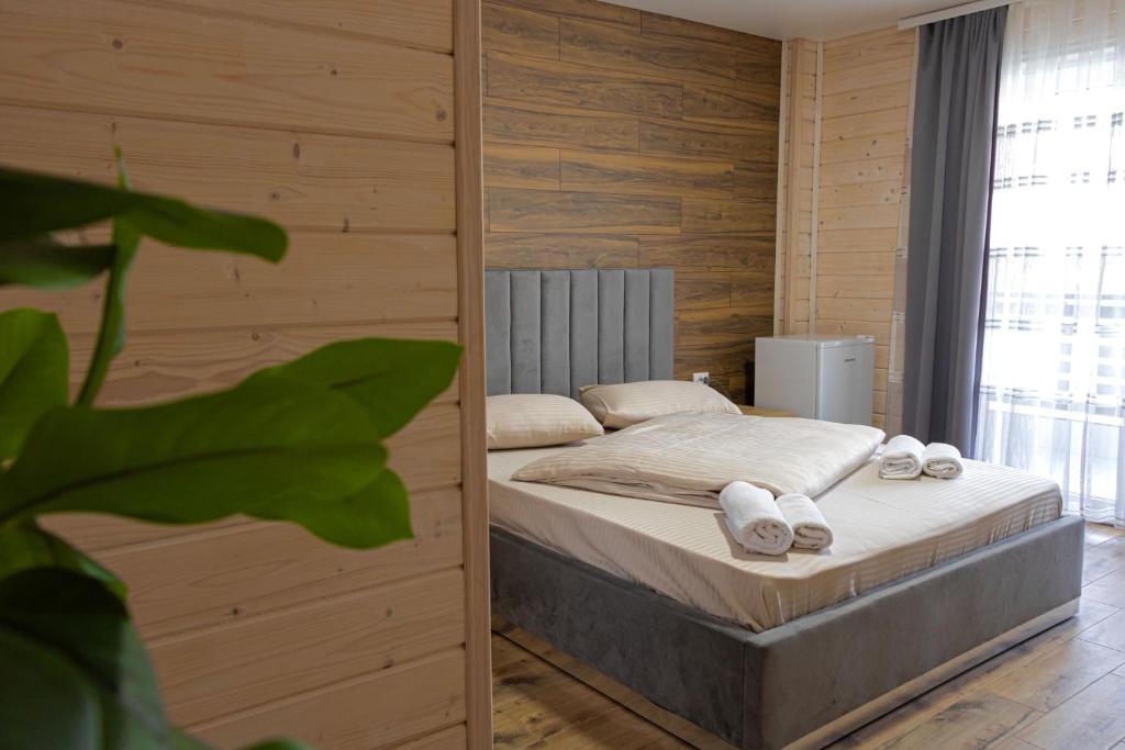 Postel nebo postele na pokoji v ubytování Lotus & Spa