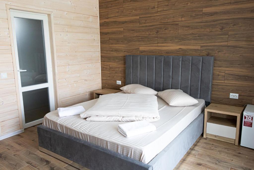 Postel nebo postele na pokoji v ubytování Lotus & Spa