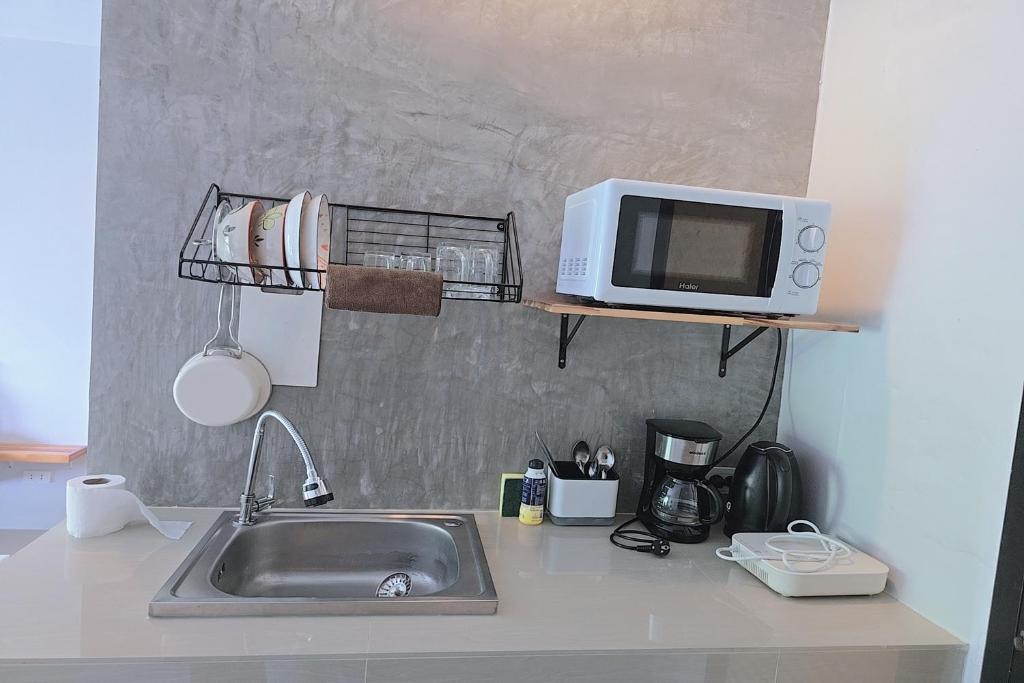 Kuchyň nebo kuchyňský kout v ubytování Aonangstudio