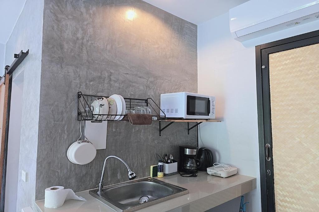 Kuchyň nebo kuchyňský kout v ubytování Aonangstudio