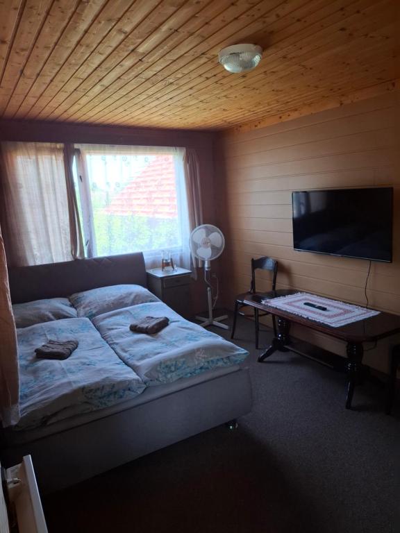 Postel nebo postele na pokoji v ubytování Ubytování Česká Skalice