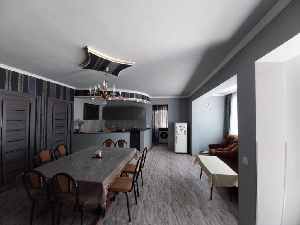 a dining room with a table and chairs at Hostel Dilijan in Dilijan