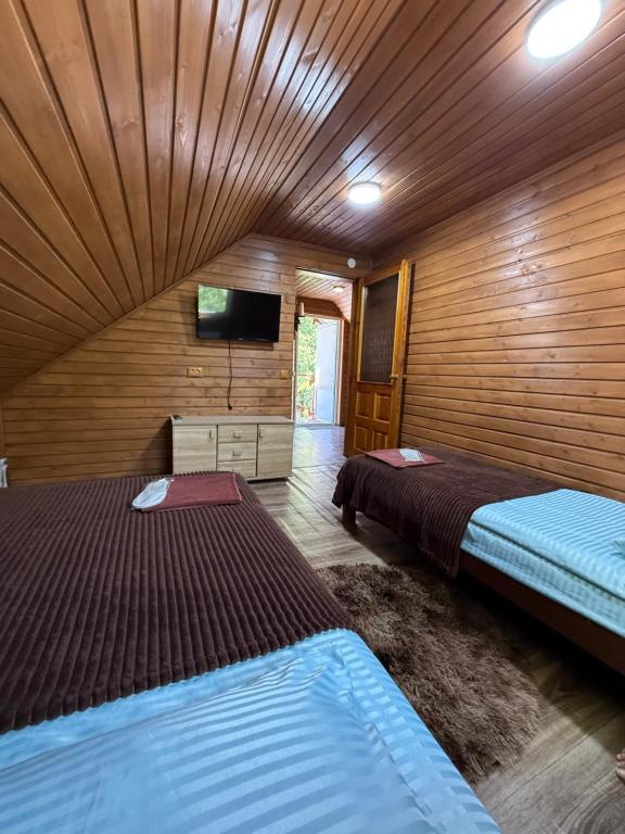 Postel nebo postele na pokoji v ubytování Садиба Сойми