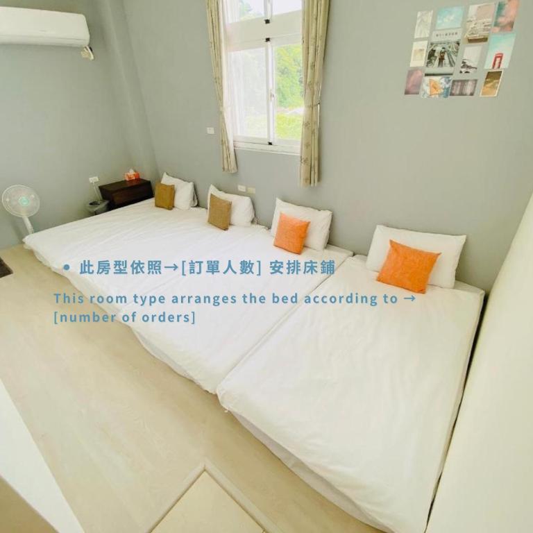 Voodi või voodid majutusasutuse 綠島夏御 微熱海岸 toas