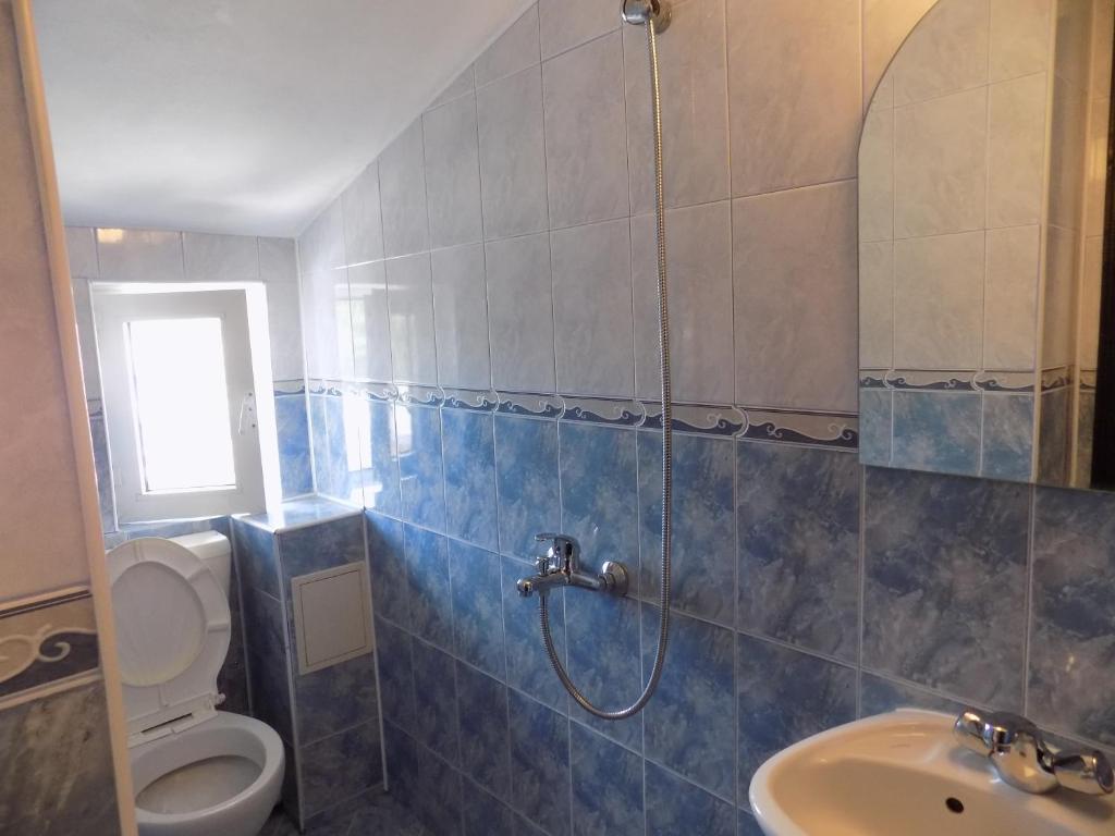 Koupelna v ubytování Rali Apartments