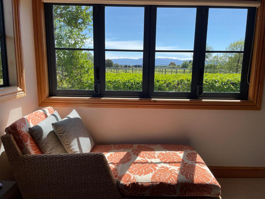 Χώρος καθιστικού στο Dara Vineyard Cottage