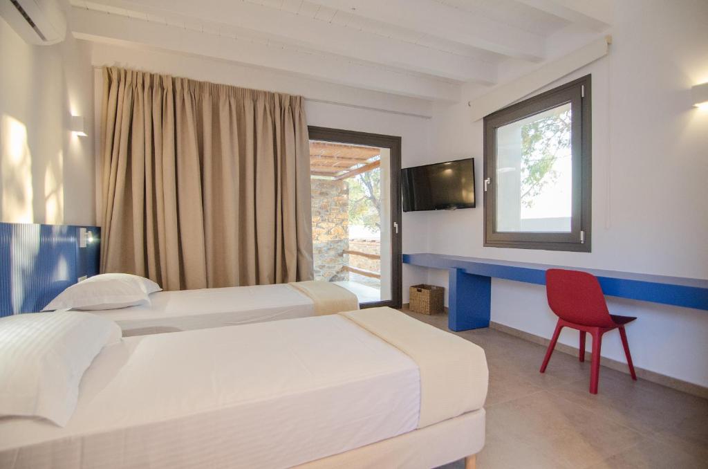 Postel nebo postele na pokoji v ubytování FarOut - BeachResort & Camping