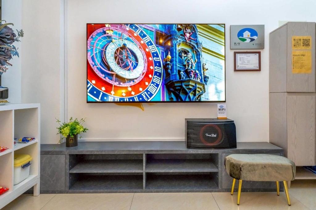 TV a/nebo společenská místnost v ubytování 十月 Mooon House