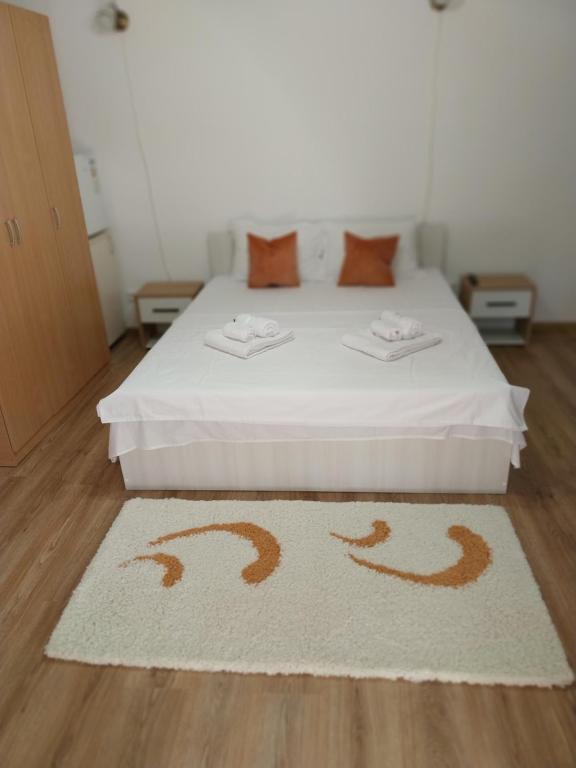 Ένα ή περισσότερα κρεβάτια σε δωμάτιο στο Apartament Dany&Diana