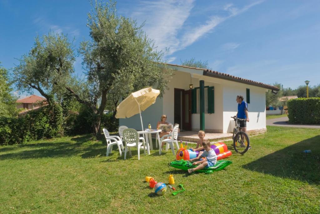 Vrt pred nastanitvijo Camping Cisano - San Vito