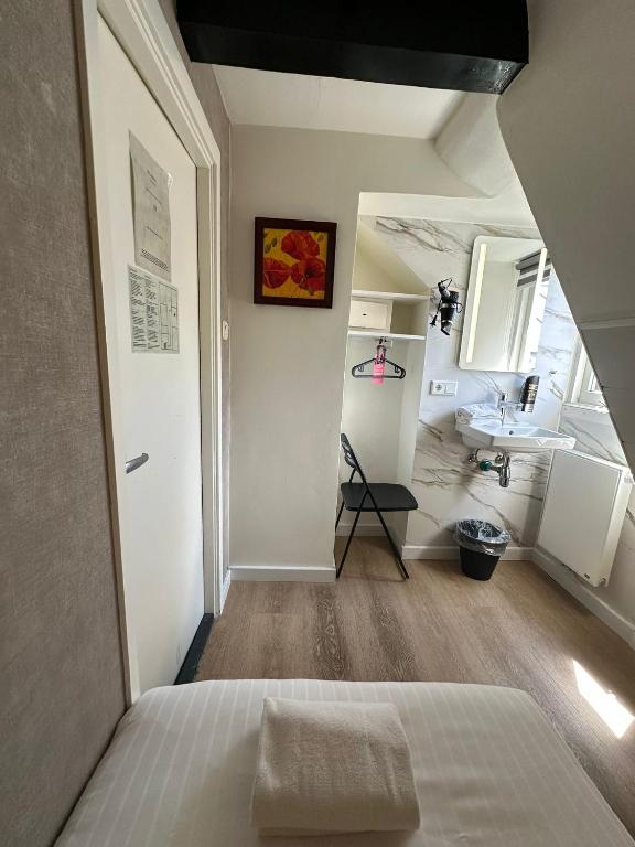 Postel nebo postele na pokoji v ubytování ITC Hotel