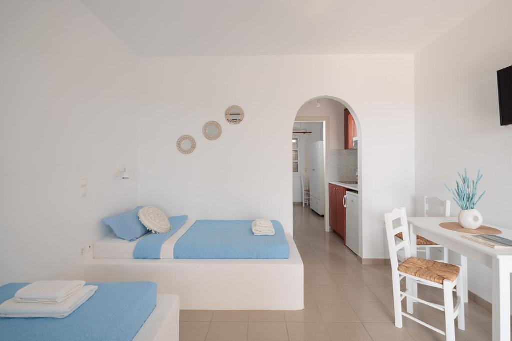 Ένα ή περισσότερα κρεβάτια σε δωμάτιο στο Aurea Blu Studio 02, sea, light and endless serenity