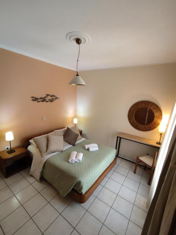 Postel nebo postele na pokoji v ubytování Alexandra Natalia Aparthotel