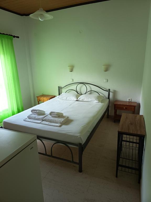 Postel nebo postele na pokoji v ubytování Soti's Rooms