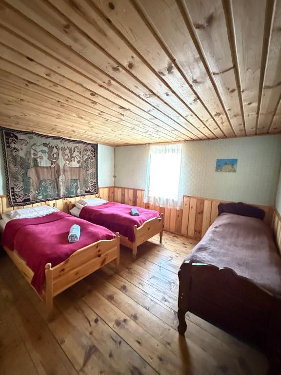 Postel nebo postele na pokoji v ubytování Guest house Sargiri