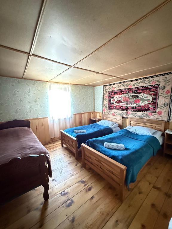 Postel nebo postele na pokoji v ubytování Guest house Sargiri