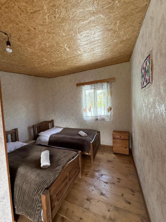 Postel nebo postele na pokoji v ubytování Guest house Sargiri