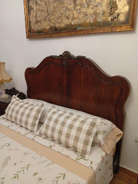 Cama o camas de una habitación en Casa Rural en San Carlos del Valle- Doña Gumersinda