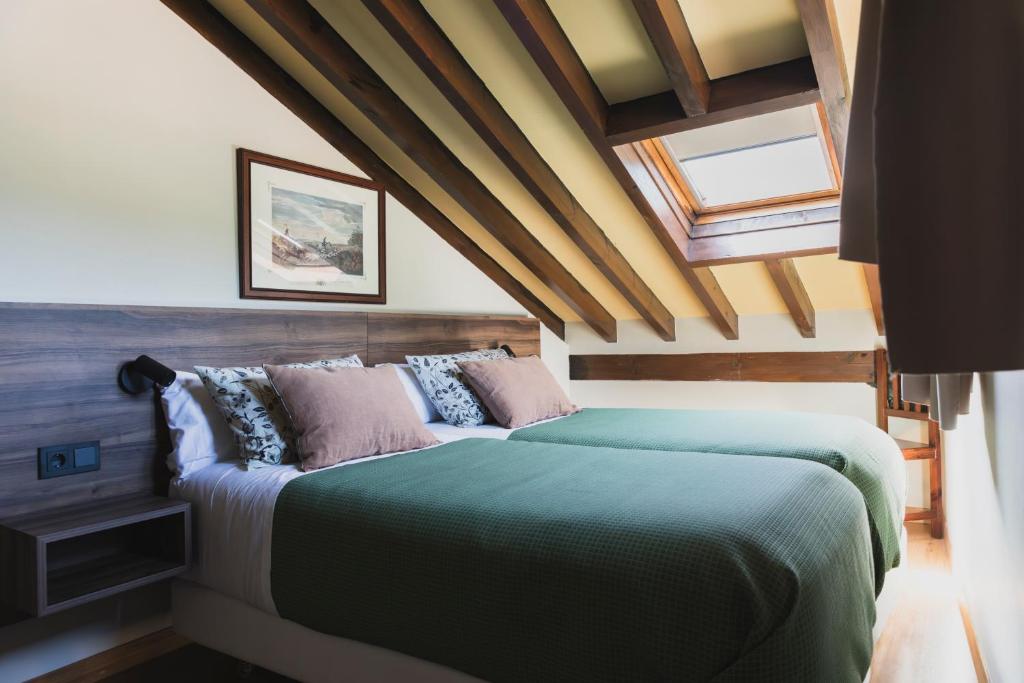 Postel nebo postele na pokoji v ubytování Apartamentos Villa de Potes