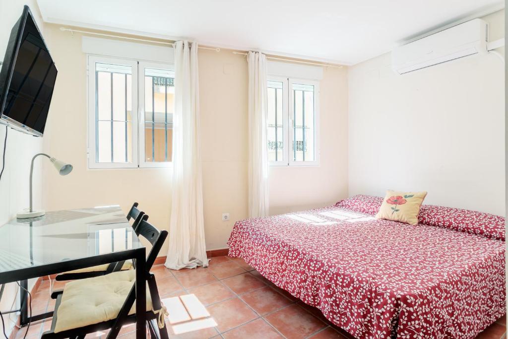 En eller flere senge i et værelse på La Korolada Guesthouse