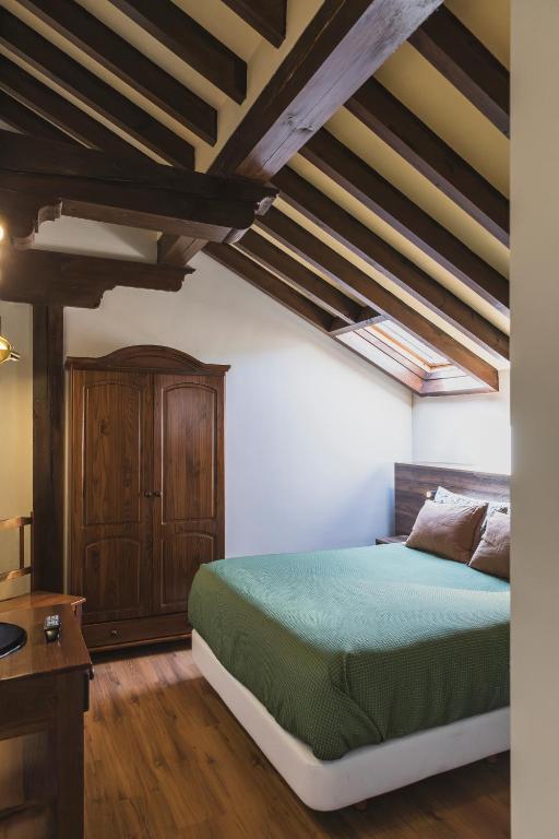 Postel nebo postele na pokoji v ubytování Apartamentos Villa de Potes