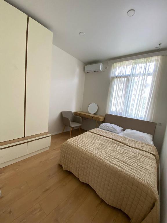Postel nebo postele na pokoji v ubytování Middle city Guesthouse