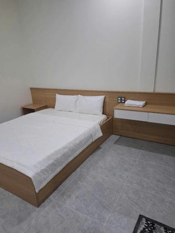 Postel nebo postele na pokoji v ubytování Villa Bãi Sau 5 Lạc Long Quân