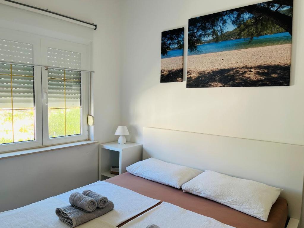 Postel nebo postele na pokoji v ubytování Sea View Apartments