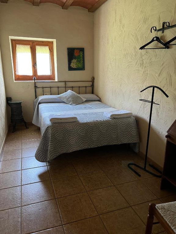 Postel nebo postele na pokoji v ubytování Casa Rural Espasa