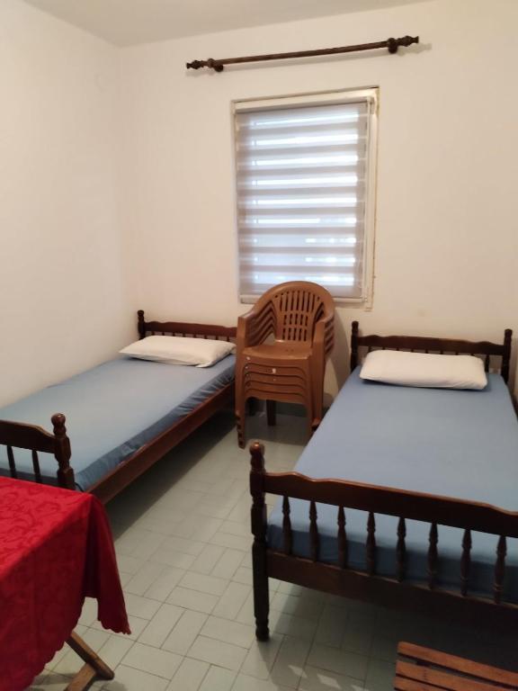 Postel nebo postele na pokoji v ubytování Guest house Gorica