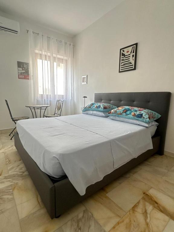 Postel nebo postele na pokoji v ubytování Affittacamere Casa Flora