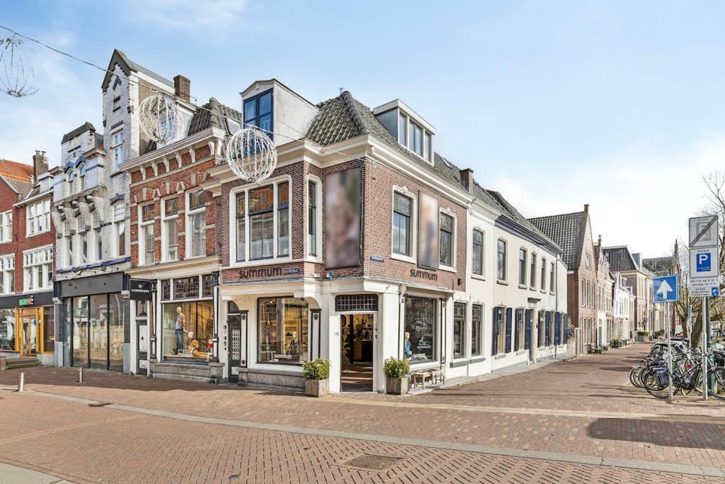 a row of buildings on a city street at Authentic stay in Alkmaar in Alkmaar