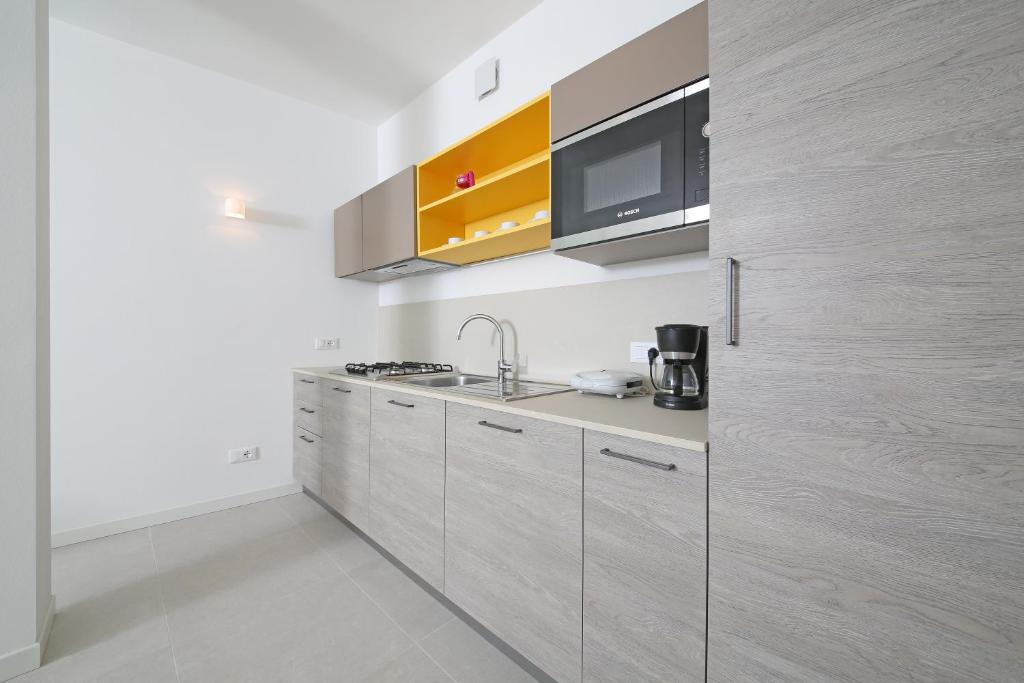 Kuchnia lub aneks kuchenny w obiekcie Villa T14