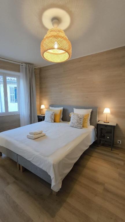 Posteľ alebo postele v izbe v ubytovaní L' Alto - 80m2, Grand Terrasse avec vue sur le Cap, à 200m des plages
