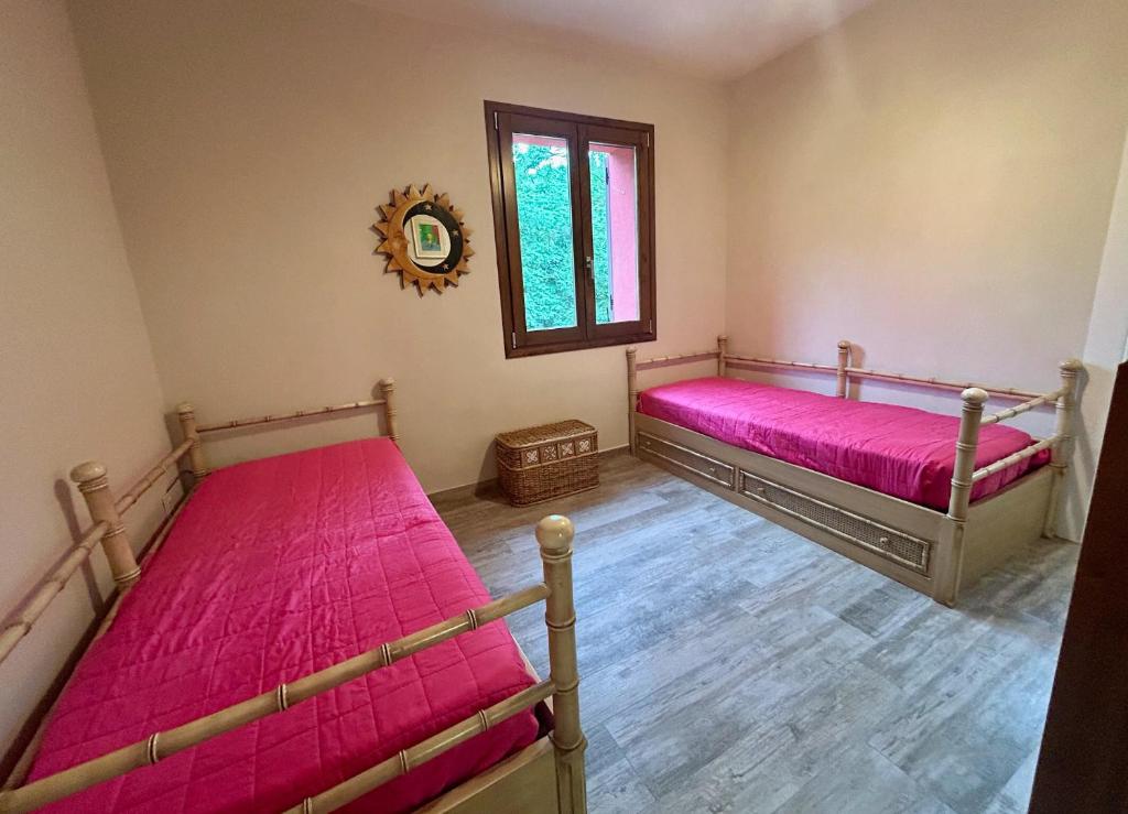 Ένα ή περισσότερα κρεβάτια σε δωμάτιο στο Casa Campagnola