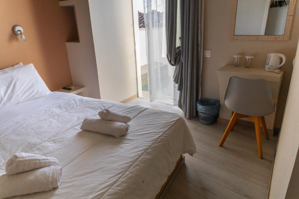 Postel nebo postele na pokoji v ubytování Hotel Diana