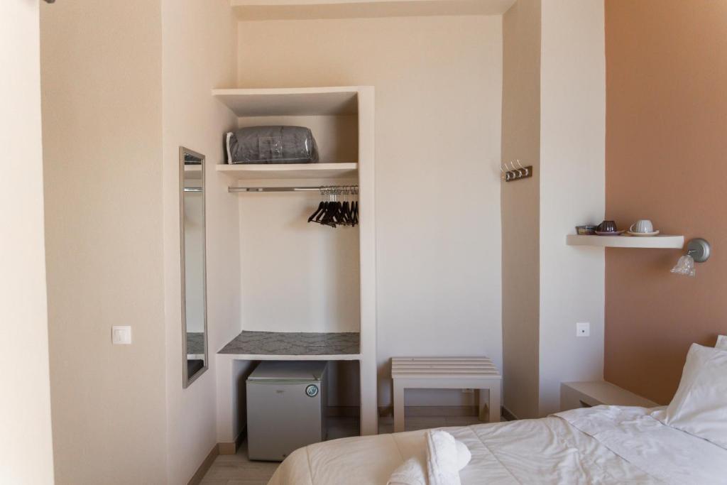 Postel nebo postele na pokoji v ubytování Hotel Diana