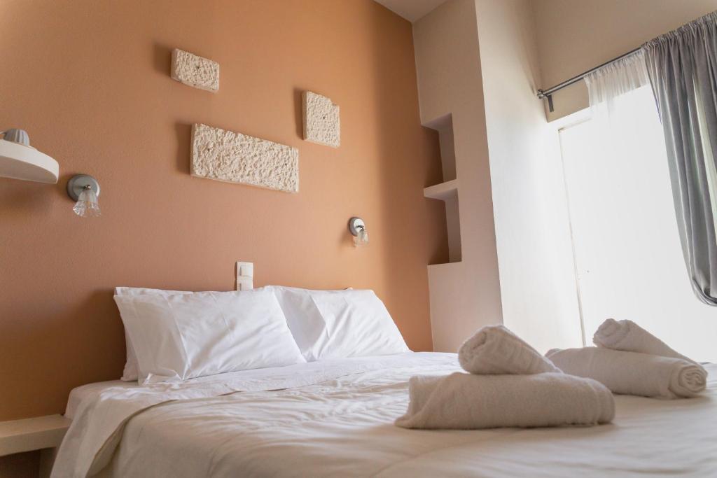 Postel nebo postele na pokoji v ubytování Hotel Diana