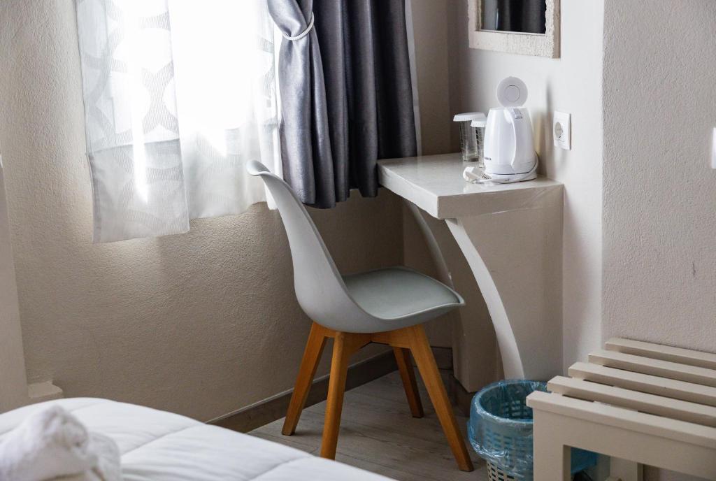 Postel nebo postele na pokoji v ubytování Hotel Diana