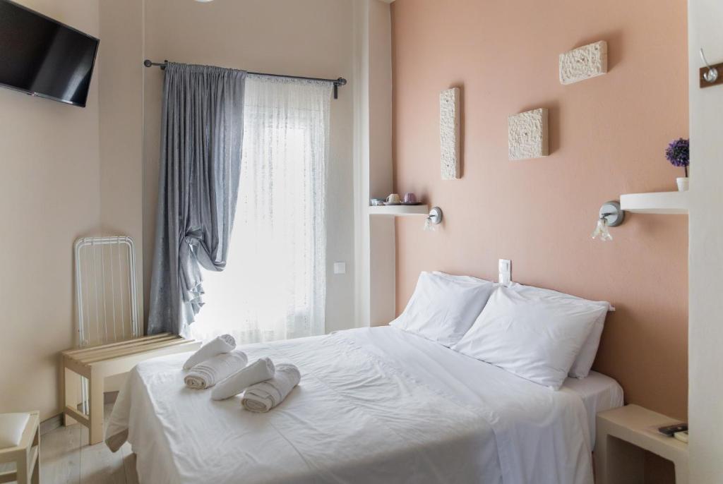 Postel nebo postele na pokoji v ubytování Hotel Diana