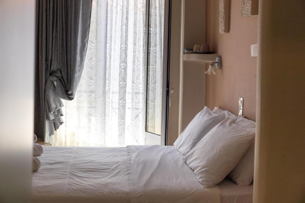 Postel nebo postele na pokoji v ubytování Hotel Diana