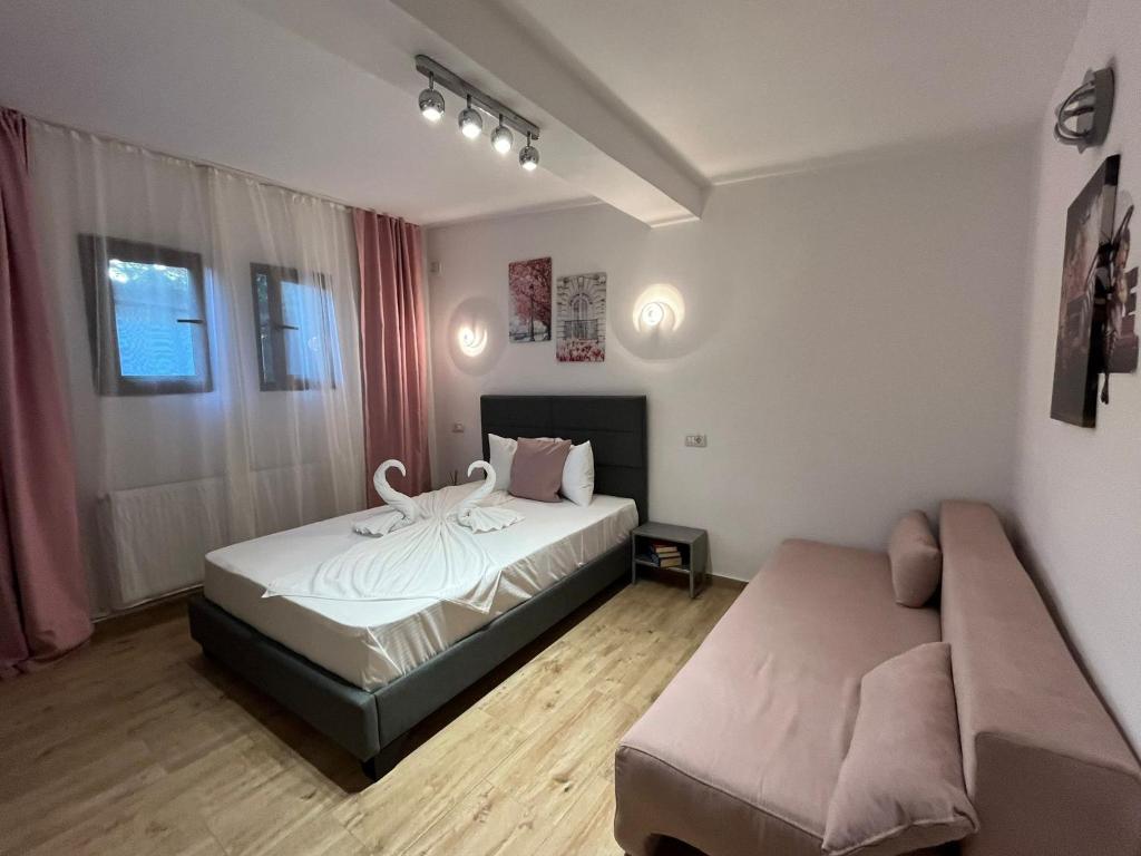 Postel nebo postele na pokoji v ubytování Casa Timerar