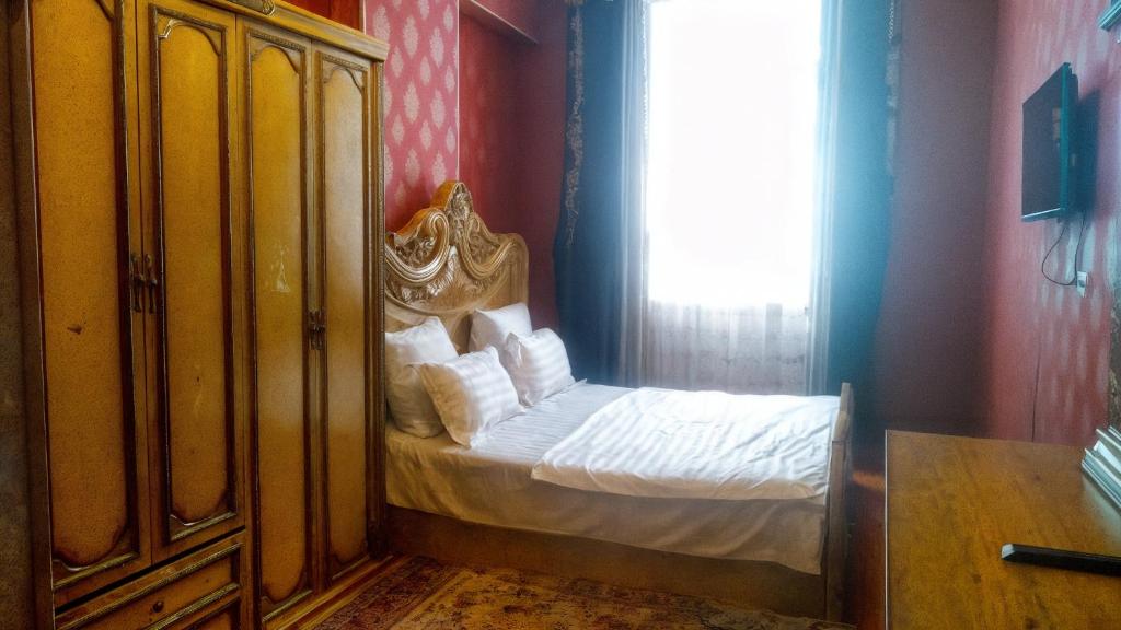 Postel nebo postele na pokoji v ubytování Двухкомнатная квартира