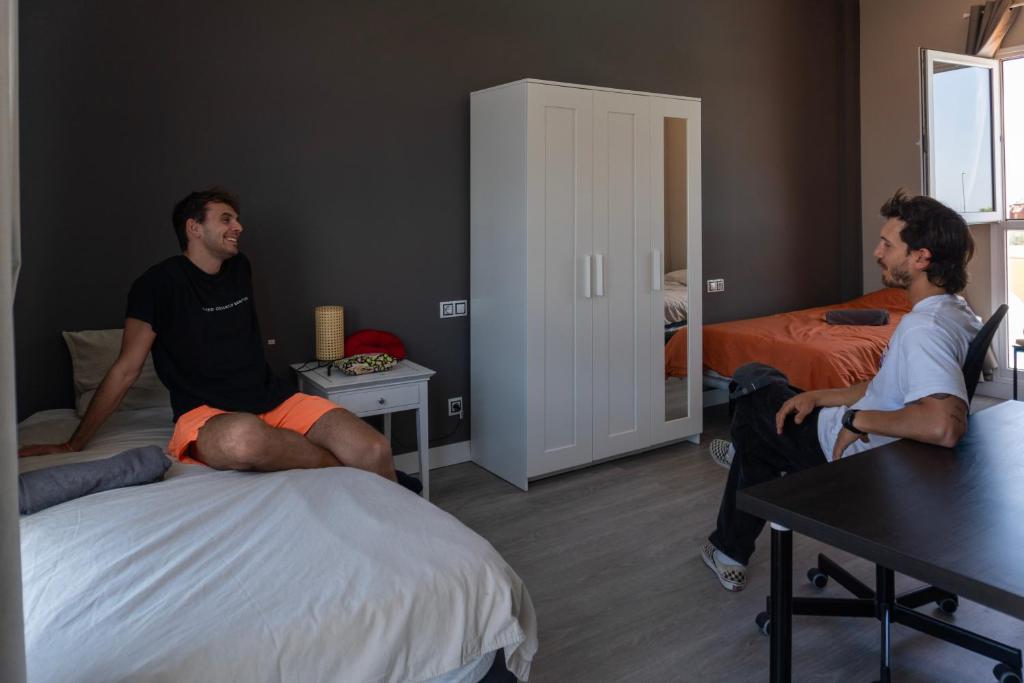 Postel nebo postele na pokoji v ubytování Banama Coliving & Coworking, Surf & Yoga - Casa Roja