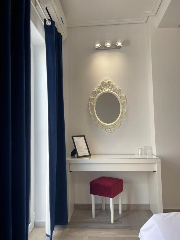 Postel nebo postele na pokoji v ubytování Cava Boutique Hotel