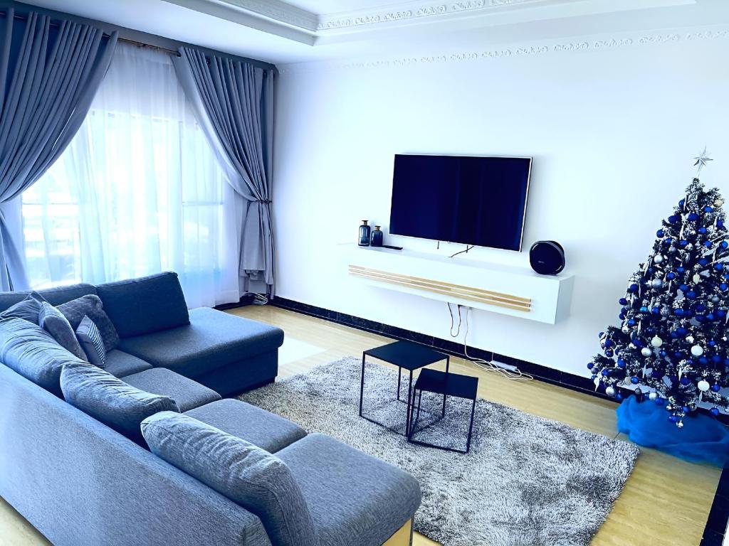TV a/nebo společenská místnost v ubytování Hembo